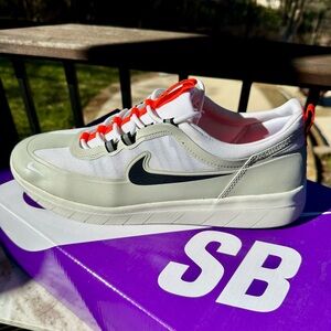 Nike White Sneakers with Sleek Design and Prominent Logo